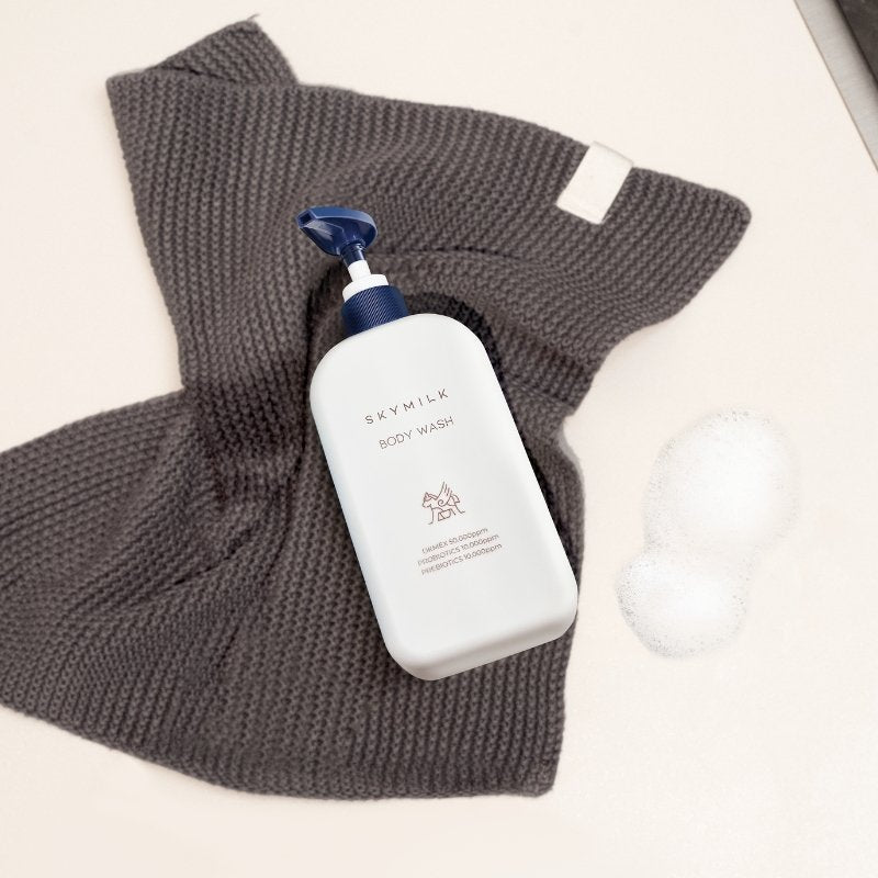 SKYMILK raminantis kūno prausiklis jautriai odai su asilės pienu ir DKMEX® - nuotrauka 2